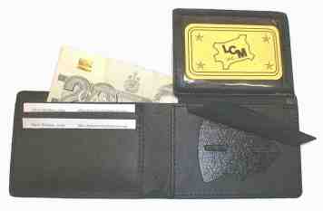     Porte-monnaie , insigne, carte et dollars